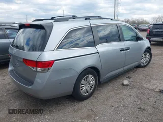 2016 Honda Odyssey LX with VIN 5FNRL5H23GB028338, listed as a IAAI auction lot 41980064 with 186,403 mi miles and . Bid and sale history available at DreamBid. Image 4.