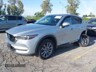 2021 Mazda CX-5 Grand Touring with VIN JM3KFADM1M1393251, listed as a IAAI auction lot 42072862 with 47,758 mi miles. Bid and sale history available at carsss.com. Image 19.