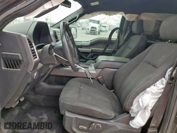 2015 Ford F-150 XLT with VIN 1FTEW1EF6FKD20492, listed as a Copart auction lot 57122105 with 126,576 mi miles and Salvage title. Bid and sale history available at DreamBid. Image 7.