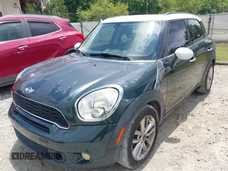2013 MINI Countryman S z VIN WMWZC3C52DWP20729, wystawiony jako IAAI lot #42388184 z przebiegiem 165 283 mil mil oraz . Historia ofert i sprzedaży dostępna na DreamBid. Obrazek 6.