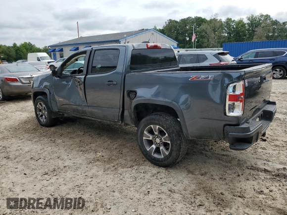 2015 Chevrolet Colorado 2WD Z71 with VIN 1GCGSCE30F1146978, listed as a Copart auction lot 56800985 with 201,186 mi miles and Salvage title. Bid and sale history available at DreamBid. Image 2.