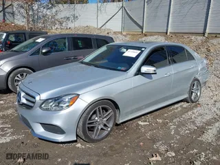 2014 Mercedes-Benz E-Class E 350 Luxury with VIN WDDHF8JB2EA891237, listed as a IAAI auction lot 41725010 with 115,429 mi miles. Bid and sale history available at carsss.com. Image 18.