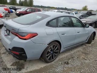 2023 BMW i4 M50 with VIN WBY33AW02PFP88948, listed as a Copart auction lot 67563423 with 2,090 mi miles. Bid and sale history available at carsss.com. Image 3.