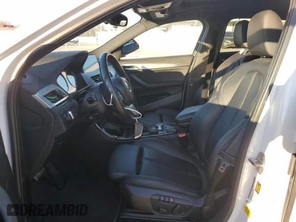 2018 BMW X2 sDrive28i with VIN WBXYJ3C3XJEJ81736, listed as a Copart auction lot 87390404 with 165,522 mi miles and Salvage Title. Bid and sale history available at carsss.com. Image 7.