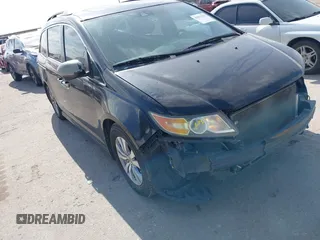 2015 Honda Odyssey EX-L with VIN 5FNRL5H68FB094983, listed as a IAAI auction lot 42031539 with 231,144 mi miles and . Bid and sale history available at DreamBid. Image 1.