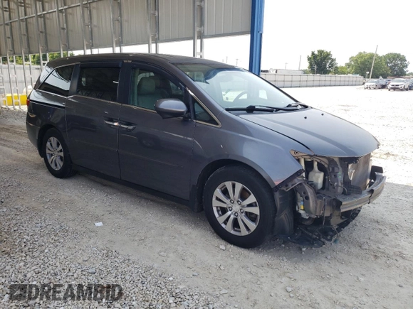 2014 Honda Odyssey EX-L with VIN 5FNRL5H60EB125478, listed as a Copart auction lot 59218355 with 165,928 mi miles and Salvage title. Bid and sale history available at DreamBid. Image 4.