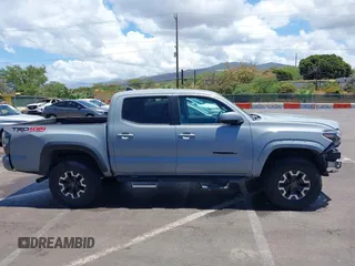 2019 Toyota Tacoma SR with VIN 3TMCZ5AN7KM213537, listed as a IAAI auction lot 42442068 with 39,969 mi miles and . Bid and sale history available at DreamBid. Image 14.