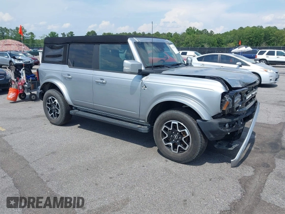 2023 Ford Bronco z VIN 1FMEE5DPXPLB06603, wystawiony jako IAAI lot #42183408 z przebiegiem 22 272 mil mil oraz . Historia ofert i sprzedaży dostępna na DreamBid. Obrazek 1.