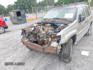 2000 Jeep Grand Cherokee Laredo z VIN 1J4G248N2YC334566, wystawiony jako IAAI lot #42623519 z przebiegiem Nie podano mil oraz . Historia ofert i sprzedaży dostępna na DreamBid. Obrazek 6.