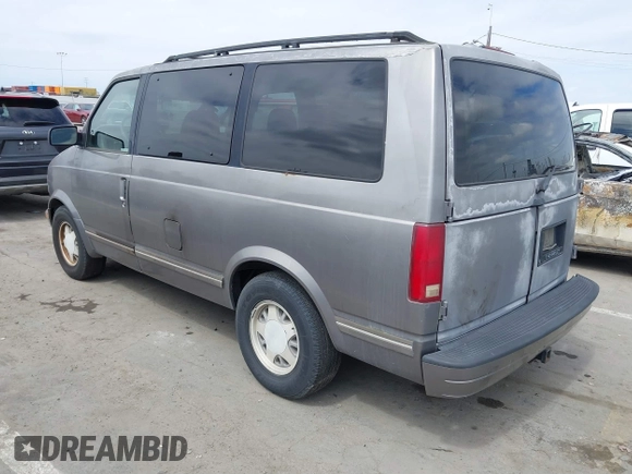 1995 Chevrolet Astro with VIN 1GNDM19W2SB240300, listed as a IAAI auction lot 41885699 with 180,150 mi miles. Bid and sale history available at carsss.com. Image 3.