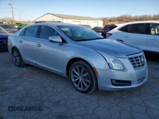 2014 Cadillac XTS with VIN 2G61L5S3XE9169958, listed as a Copart auction lot 42042145 with 100,359 mi miles and Clean Title. Bid and sale history available at carsss.com. Image 4.