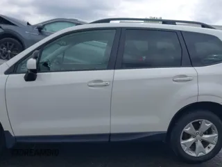 2016 Subaru Forester Premium with VIN JF2SJADC6GH514271, listed as a IAAI auction lot 42007756 with 146,301 mi miles and . Bid and sale history available at carsss.com. Image 14.