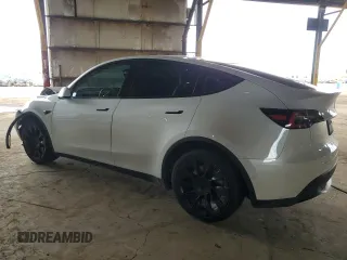 2021 Tesla Model Y Long Range with VIN 5YJYGDEE6MF075819, listed as a Copart auction lot 50903425 with 67,857 mi miles and Salvage Title. Bid and sale history available at DreamBid. Image 2.
