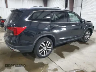 2017 Honda Pilot Touring with VIN 5FNYF6H96HB087634, listed as a Copart auction lot 63535125 with 137,129 mi miles and Salvage title. Bid and sale history available at DreamBid. Image 3.