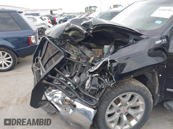 2018 GMC Sierra 1500 SLT z VIN 3GTU2NEC7JG617050, wystawiony jako IAAI lot #42403912 z przebiegiem 215 748 mil mil oraz . Historia ofert i sprzedaży dostępna na DreamBid. Obrazek 17.