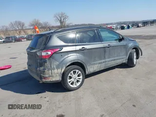 2018 Ford Escape SEL with VIN 1FMCU9HD1JUD41930, listed as a IAAI auction lot 41699203 with 114,581 mi miles. Bid and sale history available at carsss.com. Image 4.