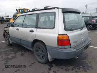 2000 Subaru Forester L with VIN JF1SF6353YH701667, listed as a IAAI auction lot 41499844 with 203,050 mi miles. Bid and sale history available at carsss.com. Image 3.