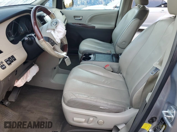 2012 Toyota Sienna XLE AAS z VIN 5TDYK3DC7CS220708, wystawiony jako Copart lot #58295075 z przebiegiem 154 529 mil mil oraz Szkoda całkowita • Salvage title. Historia ofert i sprzedaży dostępna na DreamBid. Obrazek 7.