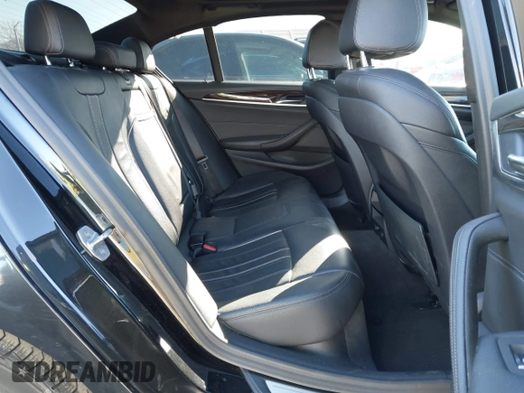 2019 BMW 5 Series 530e with VIN WBAJA9C57KB399541, listed as a IAAI auction lot 41656775 with 96,523 mi miles and . Bid and sale history available at DreamBid. Image 8.