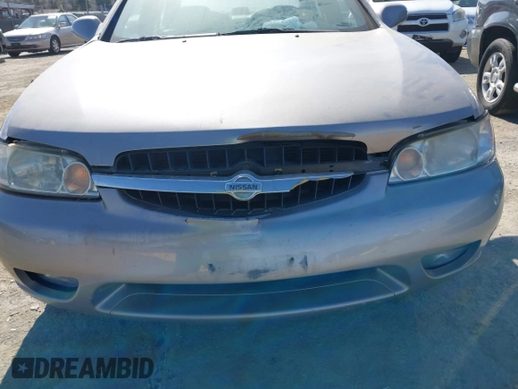 2000 Nissan Altima GXE with VIN 1N4DL01A9YC140466, listed as a IAAI auction lot 41605677 with 127,066 mi miles. Bid and sale history available at carsss.com. Image 6.