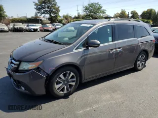 2016 Honda Odyssey Touring Elite with VIN 5FNRL5H92GB059187, listed as a Copart auction lot 62355355 with 117,883 mi miles and Salvage title. Bid and sale history available at DreamBid. Image 1.