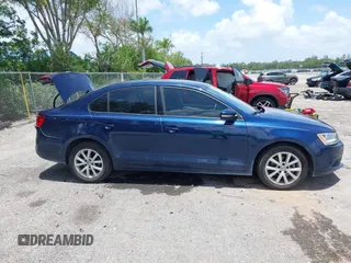 2012 Volkswagen Jetta SE with VIN 3VWDP7AJ4CM370055, listed as a IAAI auction lot 42501456 with 90,800 mi miles and . Bid and sale history available at DreamBid. Image 13.