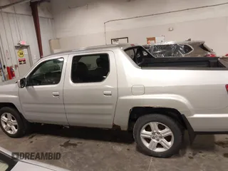 2009 Honda Ridgeline RTL with VIN 2HJYK16519H000129, listed as a IAAI auction lot 41891810 with 186,124 mi miles. Bid and sale history available at carsss.com. Image 14.
