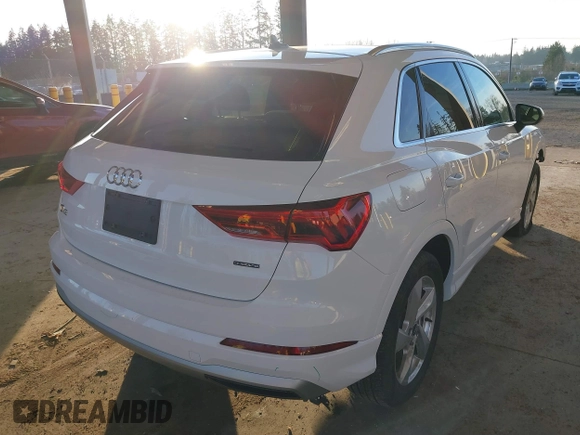 2021 Audi Q3 Premium with VIN WA1AUCF37M1087692, listed as a IAAI auction lot 41277380 with 66,039 mi miles and . Bid and sale history available at DreamBid. Image 4.