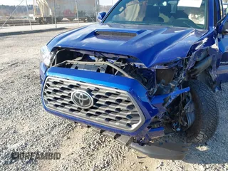 2023 Toyota Tacoma 4WD SR with VIN 3TYCZ5AN1PT119133, listed as a IAAI auction lot 41574906 with 19,887 mi miles. Bid and sale history available at carsss.com. Image 6.