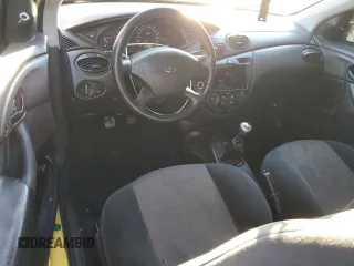 2000 Ford Focus ZX3 with VIN 3FAHP3131YR213601, listed as a Copart auction lot 88597525 with 134,724 mi miles and Salvage title. Bid and sale history available at DreamBid. Image 8.