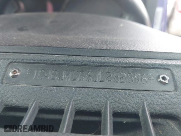 2018 Jeep Wrangler Unlimited Sport S with VIN 1C4BJWDG6JL882596, listed as a IAAI auction lot 42099289 with 121,714 mi miles and . Bid and sale history available at DreamBid. Image 9.