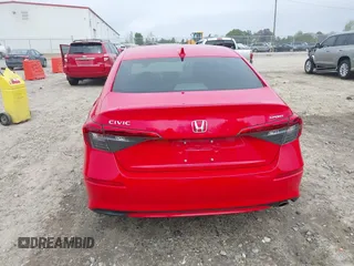 2022 Honda Civic Sport z VIN 2HGFE2F51NH534607, wystawiony jako IAAI lot #41938903 z przebiegiem 32 554 mil mil oraz . Historia ofert i sprzedaży dostępna na DreamBid. Obrazek 16.