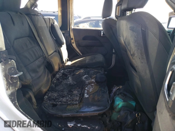 2023 Jeep Wrangler Sahara z VIN 1C4JJXP61PW519599, wystawiony jako Copart lot #51814674 z przebiegiem Nie podano mil oraz Szkoda całkowita • Salvage title. Historia ofert i sprzedaży dostępna na DreamBid. Obrazek 10.