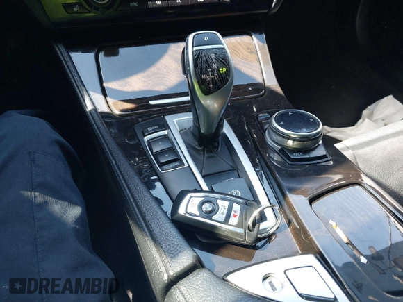2014 BMW 5 Series 535i with VIN WBA5B1C54ED917047, listed as a IAAI auction lot 41727855 with 105,460 mi miles and . Bid and sale history available at DreamBid. Image 11.
