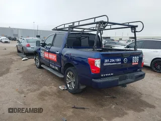 2018 Nissan Titan SV with VIN 1N6AA1E69JN500096, listed as a IAAI auction lot 41883390 with 136,752 mi miles and . Bid and sale history available at DreamBid. Image 3.