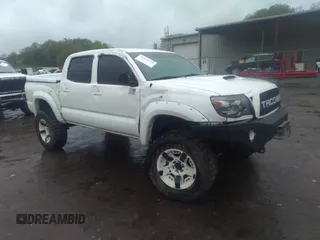 2011 Toyota Tacoma with VIN 5TFLU4ENXBX022207, listed as a IAAI auction lot 36494648 with 75,782 mi miles. Bid and sale history available at carsss.com. Image 1.