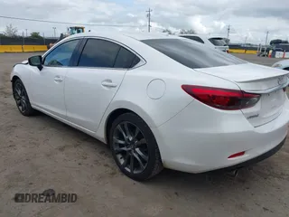 2017 Mazda 6 Grand Touring with VIN JM1GL1X57H1118646, listed as a IAAI auction lot 41896459 with 105,768 mi miles and . Bid and sale history available at carsss.com. Image 3.