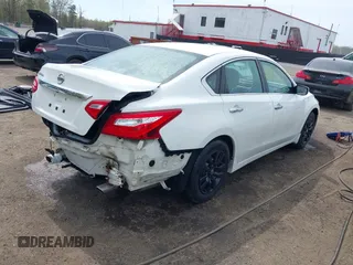 2016 Nissan Altima SL with VIN 1N4AL3AP1GC201767, listed as a IAAI auction lot 42050266 with 120,652 mi miles and . Bid and sale history available at carsss.com. Image 4.