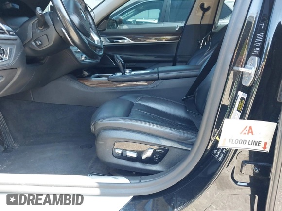 2020 BMW 7 Series 740i xDrive with VIN WBA7T4C03LGF97293, listed as a IAAI auction lot 40189953 with 64,936 mi miles and . Bid and sale history available at DreamBid. Image 6.