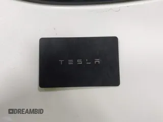 2022 Tesla Model Y Long Range z VIN 7SAYGDEE3NF358487, wystawiony jako IAAI lot #42036969 z przebiegiem 52 723 mil mil oraz . Historia ofert i sprzedaży dostępna na DreamBid. Obrazek 11.