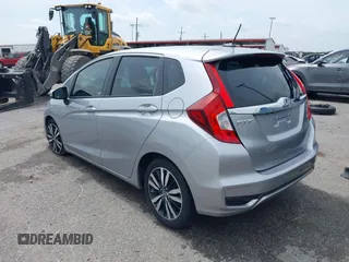 2018 Honda Fit EX with VIN 3HGGK5H81JM718009, listed as a IAAI auction lot 42337583 with 128,140 mi miles and . Bid and sale history available at DreamBid. Image 3.