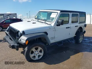 2020 Jeep Wrangler Unlimited Sport with VIN 1C4HJXDM2LW262867, listed as a IAAI auction lot 42303520 with 56,461 mi miles and . Bid and sale history available at DreamBid. Image 2.