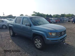 2006 Honda Ridgeline RTL with VIN 2HJYK16526H531884, listed as a IAAI auction lot 42796524 with 334,489 mi miles and . Bid and sale history available at DreamBid. Image 1.