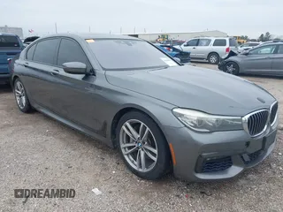 2016 BMW 7 Series 740i with VIN WBA7E2C56GG546920, listed as a IAAI auction lot 41610698 with 119,689 mi miles. Bid and sale history available at carsss.com. Image 1.