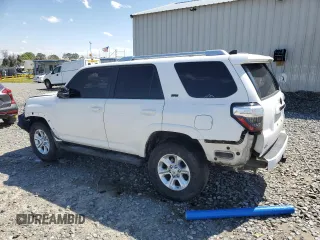 2018 Toyota 4Runner SR5 with VIN JTEBU5JR6J5497210, listed as a Copart auction lot 49704195 with 124,508 mi miles and Salvage Title. Bid and sale history available at DreamBid. Image 2.