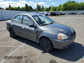 2004 Kia Rio with VIN KNADC125946330310, listed as a Copart auction lot 69411894 with 198,704 mi miles and Salvage Title. Bid and sale history available at DreamBid. Image 4.