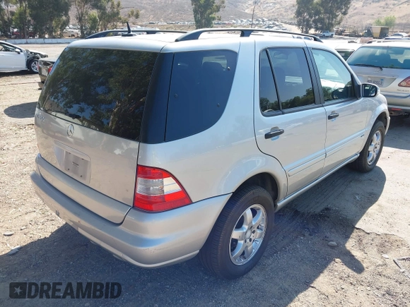 2003 Mercedes-Benz M 350 with VIN 4JGAB57EX3A438290, listed as a IAAI auction lot 42670213 with 246,915 mi miles and . Bid and sale history available at DreamBid. Image 4.