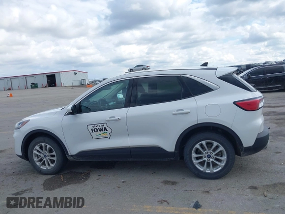 2020 Ford Escape SE with VIN 1FMCU9G67LUC31633, listed as a IAAI auction lot 42173290 with 136,937 mi miles and . Bid and sale history available at DreamBid. Image 14.