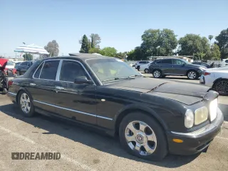 2001 Bentley Arnage z VIN SCBLC31E81CX05759, wystawiony jako Copart lot #56231445 z przebiegiem Nie podano mil oraz Tytuł czysty. Historia ofert i sprzedaży dostępna na DreamBid. Obrazek 4.