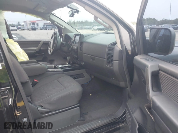 2014 Nissan Titan Pro-4X with VIN 1N6BA0EC1EN515685, listed as a IAAI auction lot 42423258 with 137,012 mi miles and . Bid and sale history available at DreamBid. Image 5.